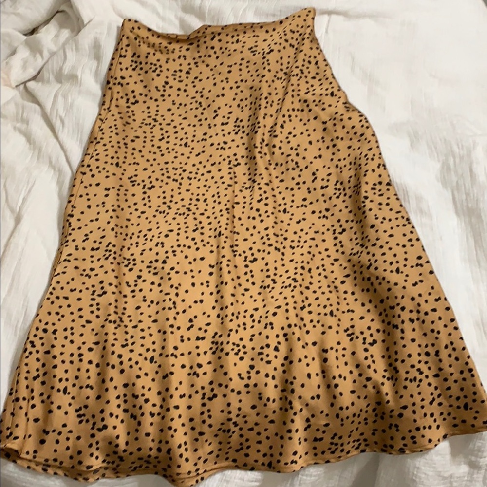 THE ICONIC LEOPARD MIDI SKIRT